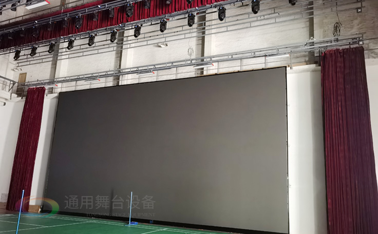 廣州黃花崗禮堂選擇通用舞臺！禮堂舞臺阻燃幕布、吊桿、舞臺燈光項目圓滿竣工！